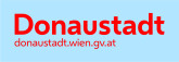Das Logo der Donaustadt: Rote Schrift auf blauem Hintergund